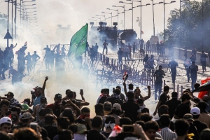 منظمة دولية :القوات الامنية استخدمت القوة القاتلة ضد المتظاهرين والاعتداء على الفارين منهم وسيارات الاسعاف ووسائل الاعلام 