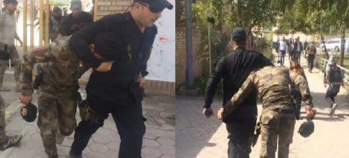 بالصور ...فقط في العراق... رجل امن يعتقل رجل امن!!!!